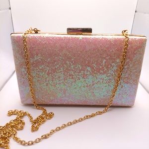 NWOT Charming charlie RSVP filter chain clutch 8" wide, 3 3/4" high.